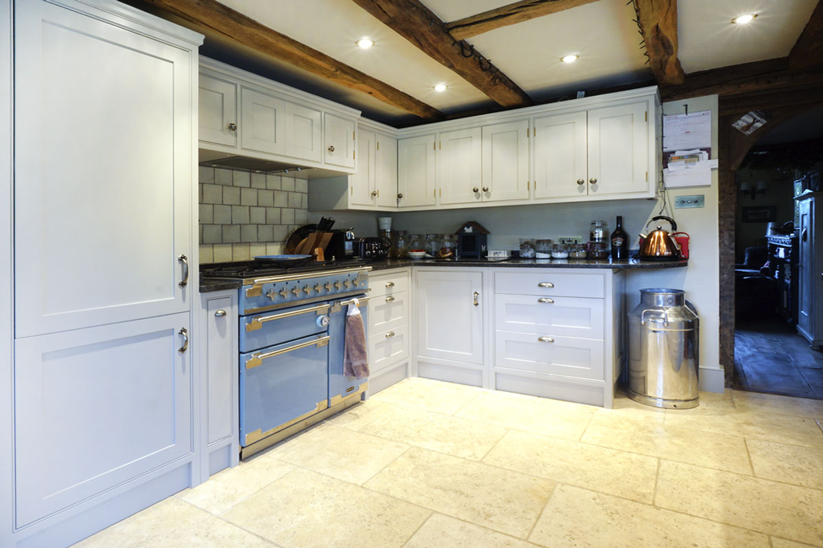 Traditional kitchen with range, oak beams